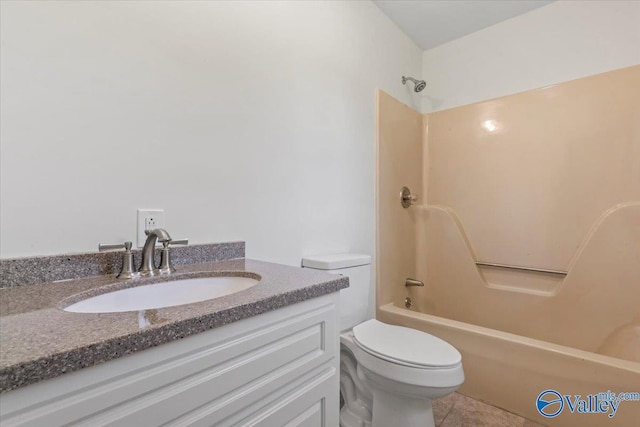 304 Ohara Dr, Albertville, AL 35950 - full bathroom featuring toilet,  shower combination, vanity, and tile patterned flooring