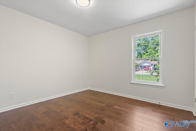 304 Ohara Dr, Albertville, AL 35950 - empty room featuring baseboards and dark wood-style floors