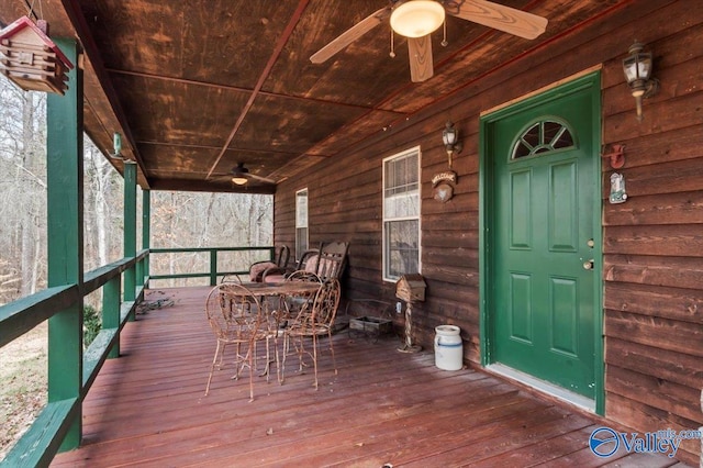 wooden deck with ceiling fan and covered porch