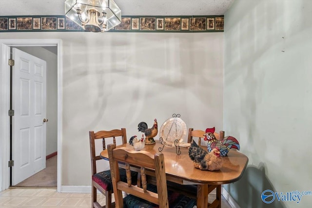 dining room featuring a notable chandelier