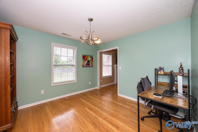 27586 Phillip Wagnon Dr, Athens, AL 35613 - office space featuring a chandelier, baseboards, and light wood finished floors