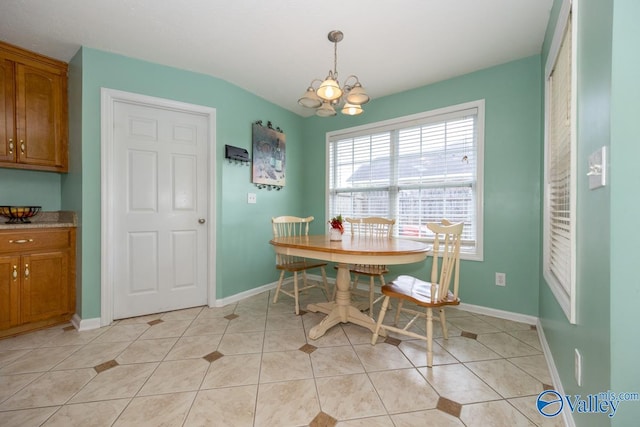 27586 Phillip Wagnon Dr, Athens, AL 35613 - dining space featuring baseboards, a chandelier, and light tile patterned floors