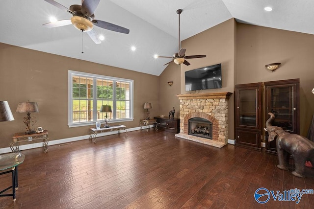 living room featuring dark hardwood / wood-style flooring, a fireplace, high vaulted ceiling, and ceiling fan