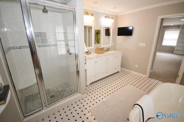 bathroom featuring shower with separate bathtub, ornamental molding, and vanity