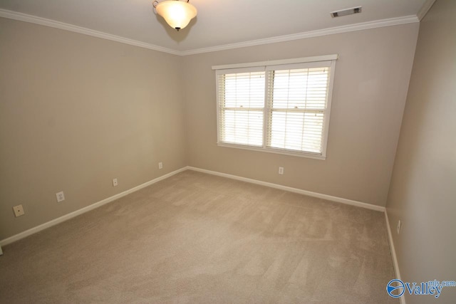 unfurnished room featuring crown molding and light colored carpet