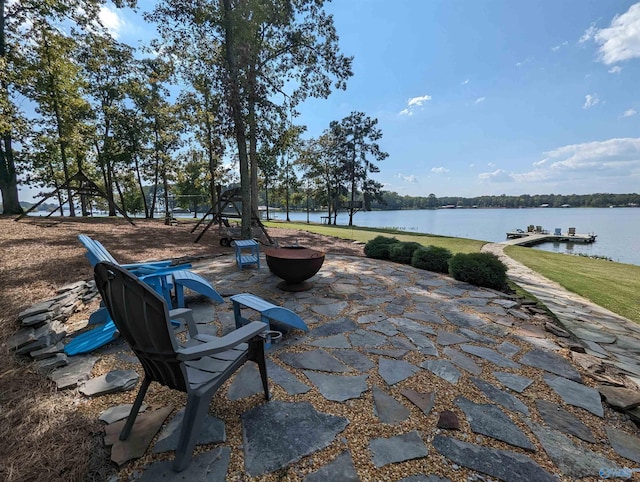 view of patio featuring a water view