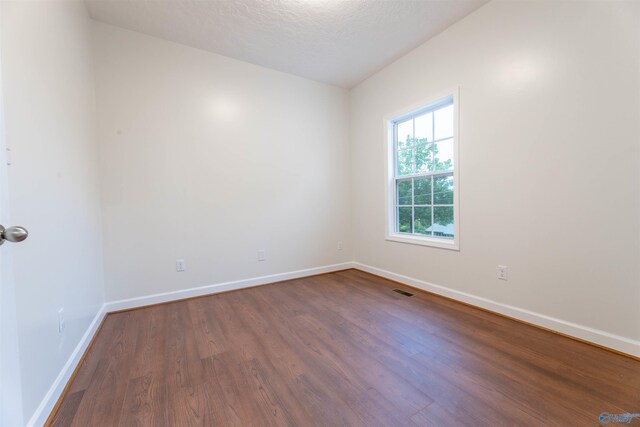 2115 James Dr, Southside, AL 35907 - unfurnished room featuring wood finished floors and baseboards