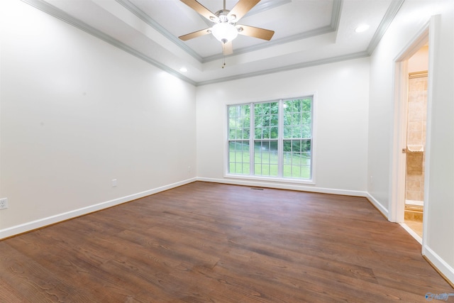 2115 James Dr, Southside, AL 35907 - spare room with ornamental molding, a ceiling fan, a tray ceiling, dark wood-style flooring, and baseboards