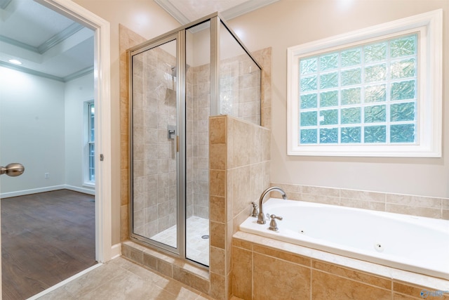 2115 James Dr, Southside, AL 35907 - full bathroom with crown molding, healthy amount of natural light, a stall shower, and a whirlpool tub