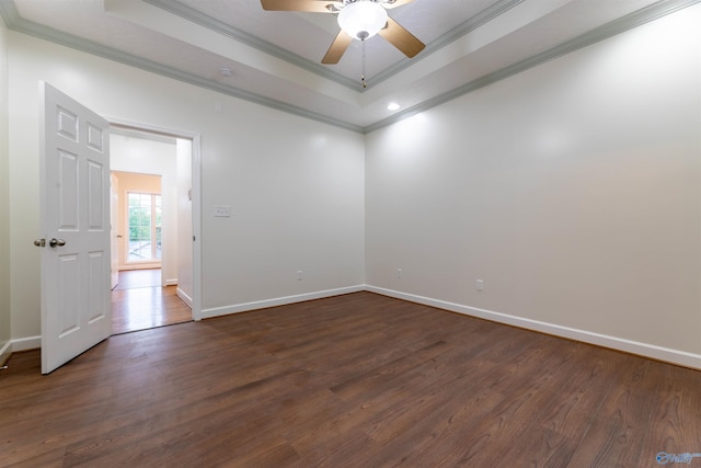 2115 James Dr, Southside, AL 35907 - empty room featuring ornamental molding, dark wood-style floors, a ceiling fan, a raised ceiling, and baseboards