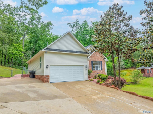 2115 James Dr, Southside, AL 35907 - view of front of house with brick siding and driveway