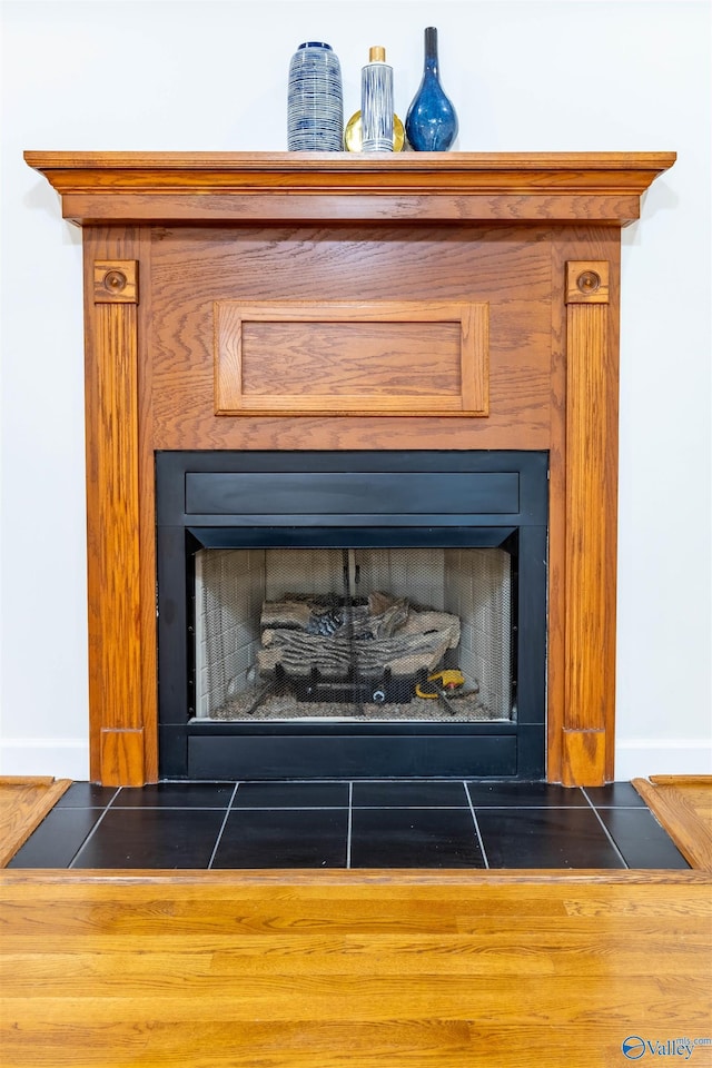 2115 James Dr, Southside, AL 35907 - detailed view of a fireplace with flush hearth and baseboards
