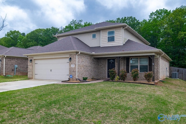 traditional-style home featuring an attached garage, driveway, a front lawn, and brick siding