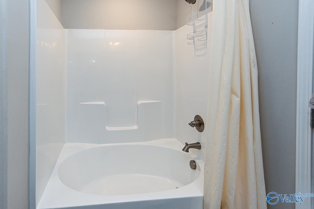 full bath featuring shower / bath combination with curtain