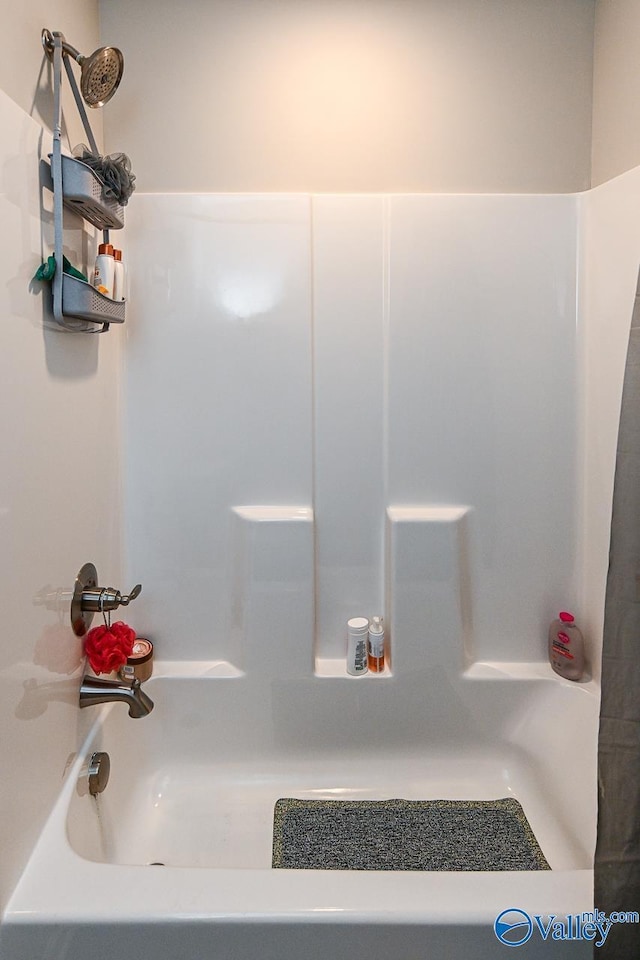 full bathroom with tub / shower combination