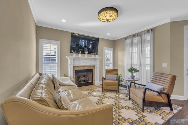 living room featuring hardwood / wood-style floors and ornamental molding