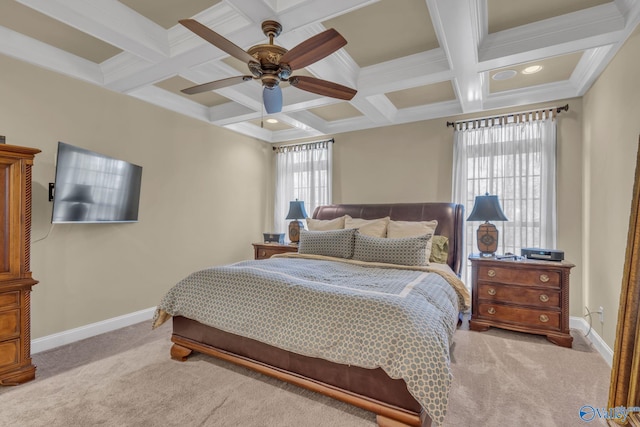 bedroom with light carpet, beam ceiling, ceiling fan, and coffered ceiling