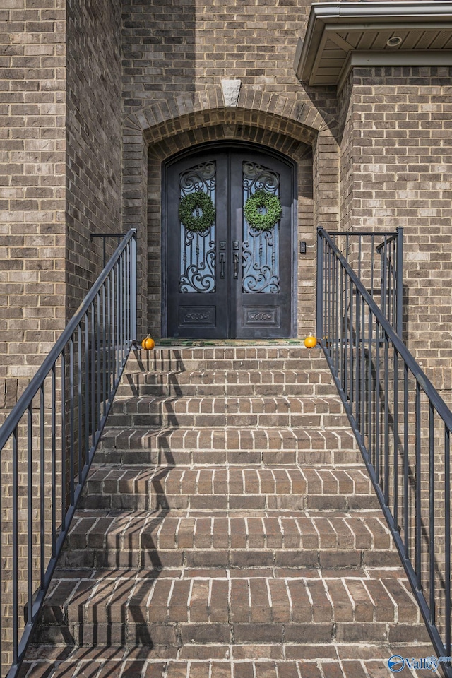 entrance to property featuring french doors