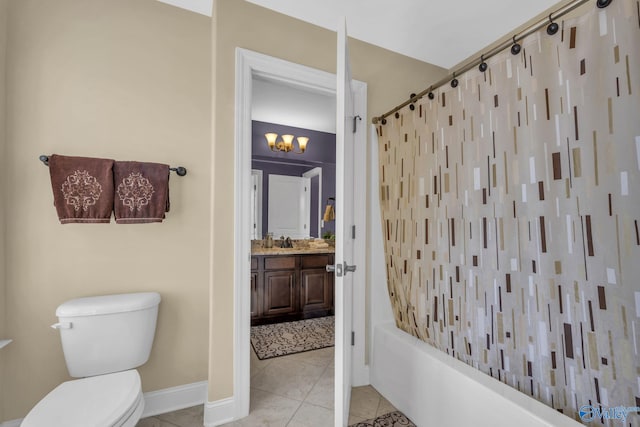 full bathroom with vanity, tile patterned flooring, toilet, shower / bath combo with shower curtain, and a chandelier