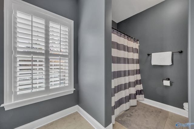 bathroom featuring toilet