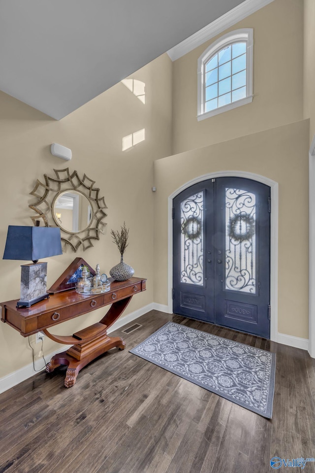 entryway featuring french doors and dark hardwood / wood-style floors