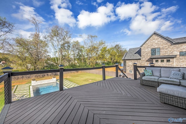 deck with a pool and an outdoor hangout area