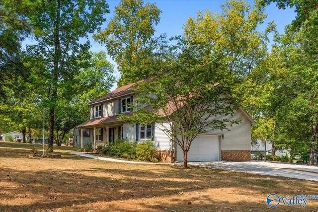 view of front facade featuring a garage and a porch