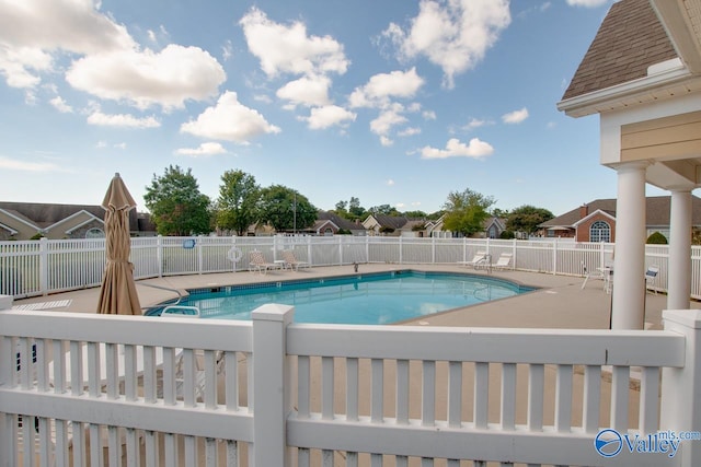 view of swimming pool featuring a patio area