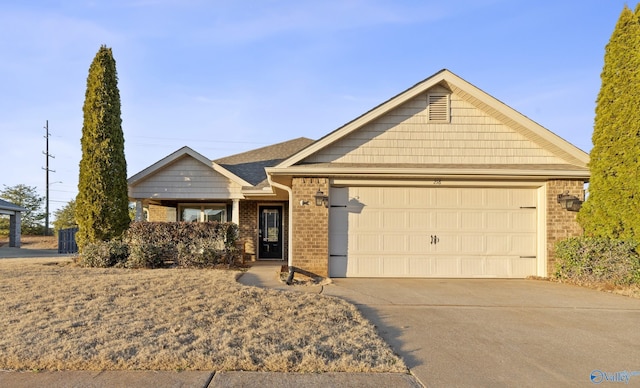 view of front of property with a garage