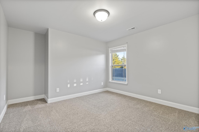 unfurnished room with carpet