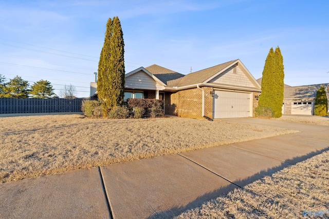 ranch-style house featuring a garage