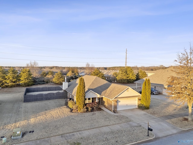 view of front of property with a garage