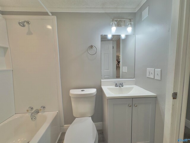 full bathroom featuring bathtub / shower combination, a textured ceiling, toilet, vanity, and ornamental molding