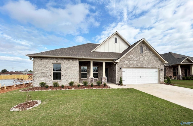 craftsman-style home with a garage and a front lawn