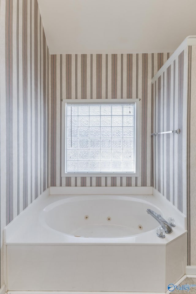 bathroom with a bathing tub