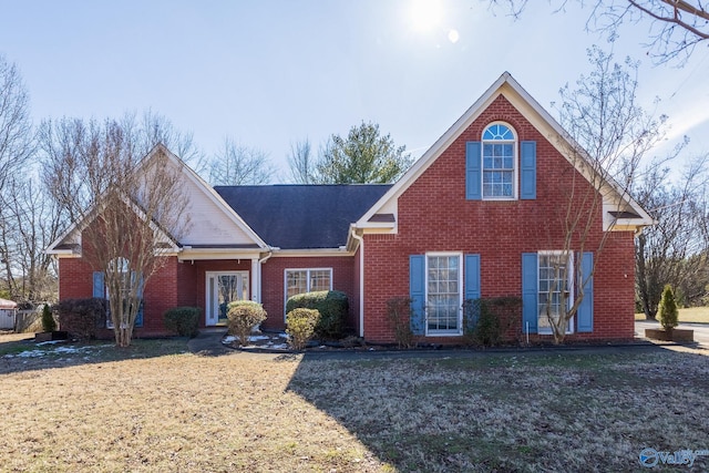 view of front property with a front lawn