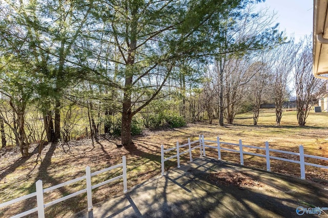 view of yard with a rural view