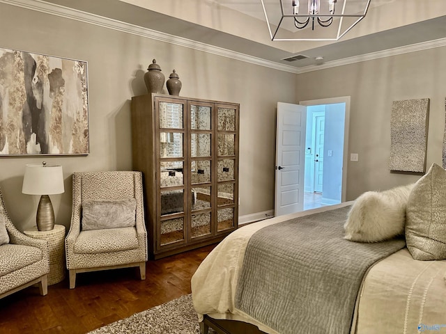 bedroom with crown molding, dark hardwood / wood-style floors, and a notable chandelier