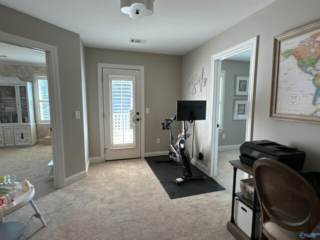 garage featuring a garage door opener and white refrigerator