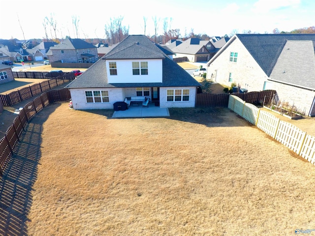 rear view of property with a patio