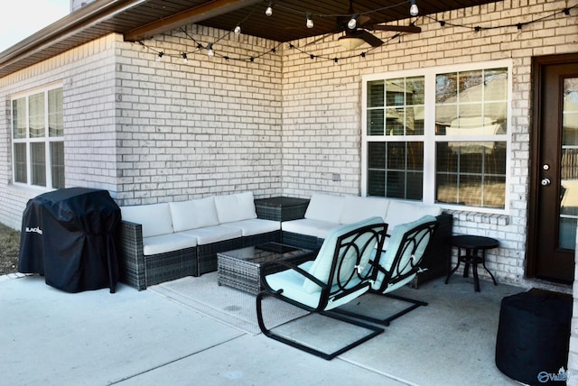 view of patio with outdoor lounge area, ceiling fan, and grilling area