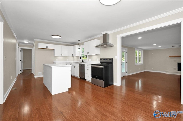 kitchen featuring sink, wall chimney range hood, white cabinetry, stainless steel appliances, and dark hardwood / wood-style flooring