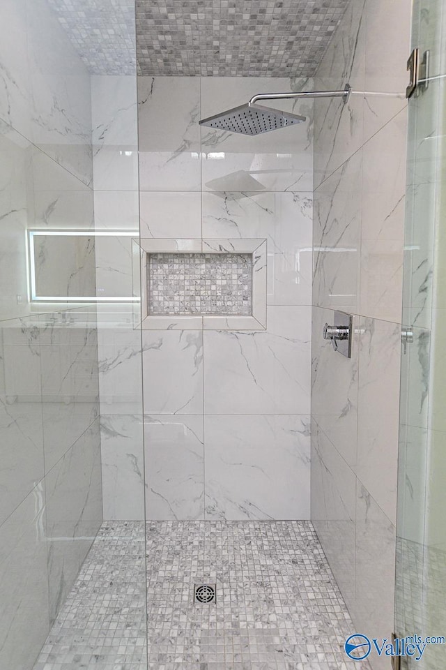 full bathroom featuring a stall shower