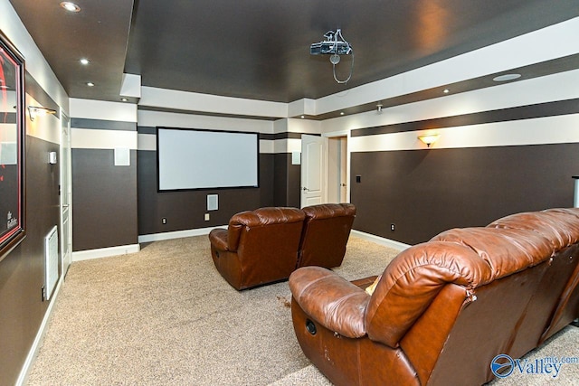 cinema featuring carpet floors, visible vents, and baseboards