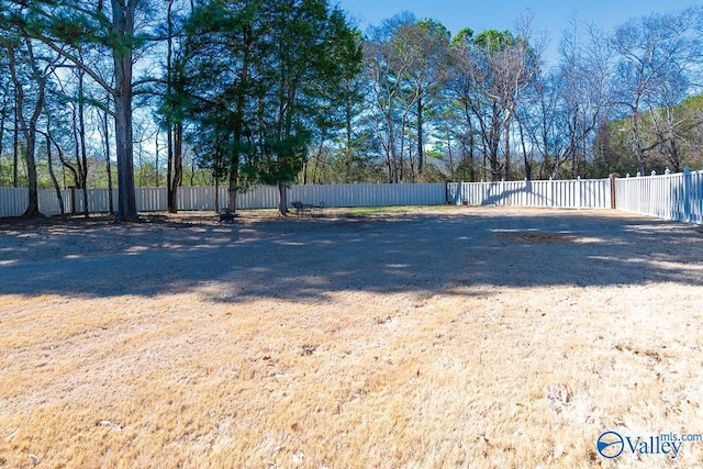 view of yard featuring fence