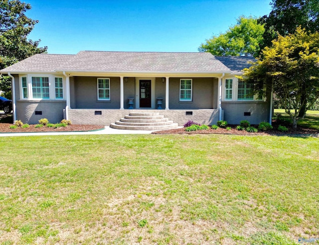 ranch-style home with a front lawn