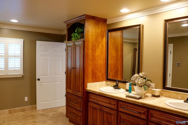 full bathroom with crown molding, double vanity, and a sink