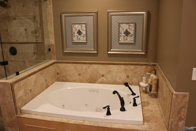 bathroom featuring a whirlpool tub