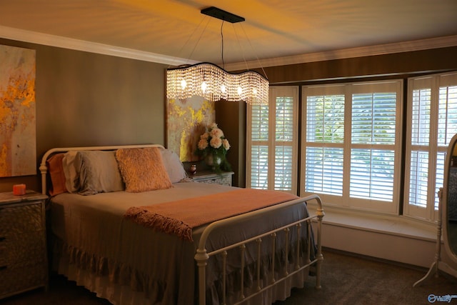 carpeted bedroom featuring crown molding
