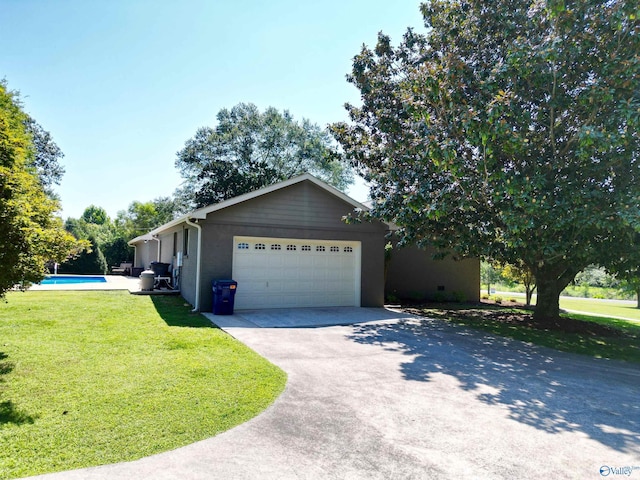 view of front facade featuring an outdoor pool, driveway, an attached garage, and a front lawn